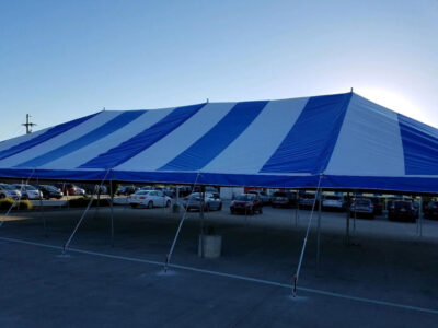 Blue Tent In Parking Lot